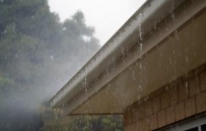 gutters in rain overflowing