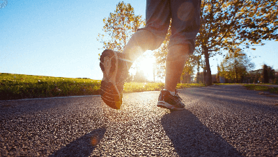 Person running during sunrise