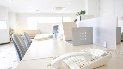 Phone sitting on desk in an office